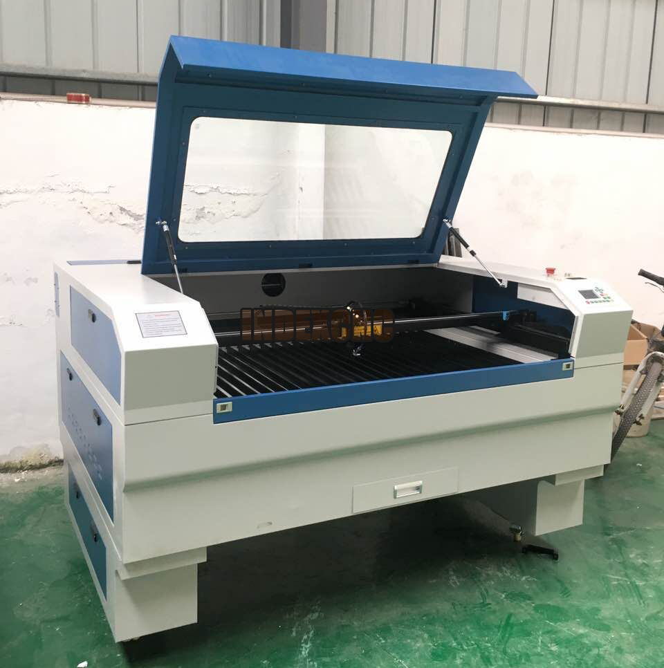 Dual heads laser cutting machine